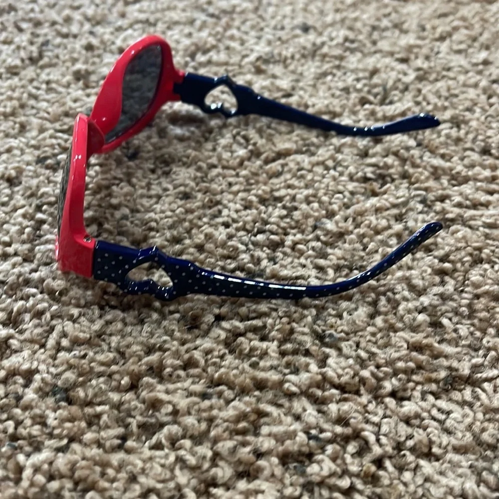 2 pair kids sunglasses and 1 case.